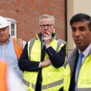 Michael Gove pictured in Norwich on Tuesday alongside Prime Minister Rishi Sunak