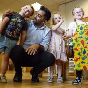 Humza Yousaf meets with children during a visit to Rowantree Primary School Early Years Service in Dundee