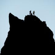 Robbie Phillips and his team on top of 'the thumb' sea stack in St Kilda