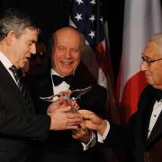 Prime Minister Gordon Brown (left) is awarded the Appeal of Conscience Foundation's World Statesman of the Year Award Henry Kissinger (right) in New York