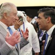 King Charles speaks with Rishi Sunak at the COP28 climate summit in Dubai