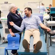 Humza Yousaf joked about trying to dodge the ironing as he encouraged people to donate blood