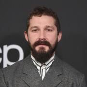 Shia LaBeouf was filmed flipping his baseball cap off, raising his fists, and shouting “let’s go” at a group of men