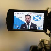 Humza Yousaf delivers a speech at the University of Glasgow