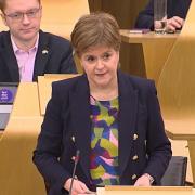 Nicola Sturgeon received applause in the Scottish Parliament for her work on The Promise