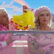 This image released by Warner Bros. Pictures shows Ryan Gosling, left, and Margot Robbie in a scene from Barbie (Warner Bros. Pictures via AP).