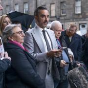 Solicitor Aamer Anwar with members of the Scottish Covid Bereaved Group outside the UK Covid-19 Inquiry