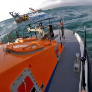 The four people had to be rescued after the boat started to take on water