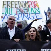 Stella Assange (centre) the wife of Julian Assange, marches to Downing Street with supporters, from the Royal Courts of Justice in London