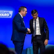 Douglas Ross and Rishi Sunak shake hands at the Scottish Conservatives party conference