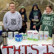 Campaigners set up a stall to redistribute stolen baby formula