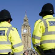Police officers pictured in front of Big Ben