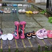 Youth Demand laid rows of children’s shoes in front of the Labour leader’s door, to signify children killed in Gaza