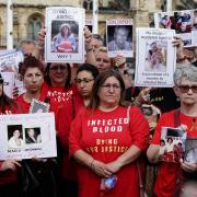 Infected blood campaigners in Parliament Square