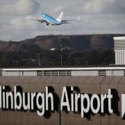 Edinburgh Airport said the IT outage is causing longer waiting times as the computer error has caused departure screens to malfunction