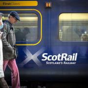 The Scottish Government's scrapping of peak rail fares has saved regular passengers money, analysis found