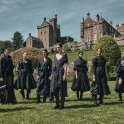 A group of Dior models at Drummond Castle