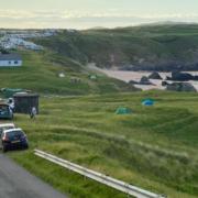The man, who has yet to be traced, hit one of the riders in the head near Durness in the far north Highlands
