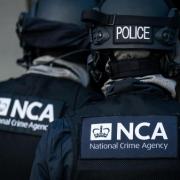 Archive image of officers with the National Crime Agency