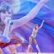 Taylor Swift performing a record-breaking crowd in Edinburgh