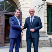 John Swinney shakes hands with European Affairs Minister in the Bavarian State Chancellery Eric Beisswenger