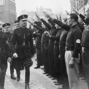 Sir Oswald Ernald Mosley inspects members of his British Union of Fascists in Royal Mint Street, London in 1936