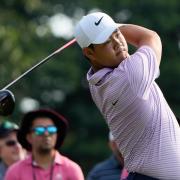 Tom Kim, of South Korea, hits from the first tee during the second round of the Travelers Championship (Seth Wenig/AP)