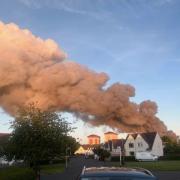Residents have been urged to stay indoors as crews continue to tackle the blaze