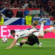 Scotland's Stuart Armstrong (right) is brought down by Hungary's Willi Orban during the UEFA Euro 2024 Group A match at the Stuttgart Arena in Stuttgart, Germany