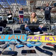 Campaigners piled electrical waste outside the Scottish Parliament ahead of the final debate on a new circular economy law