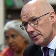 Scottish First Minister and SNP leader John Swinney during a visit to the Iqra Academy Mosque in Edinburgh