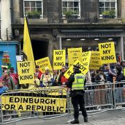 Protesters held a demonstration against the monarchy as the King and Queen visited Edinburgh