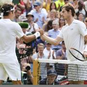 Andy Murray shakes hands with Roger Federer after being defeated in the Wimbledon semi-final in 2015