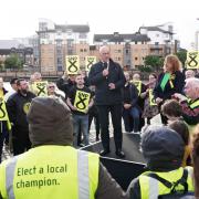 Scottish First Minister and SNP leader John Swinney gives a speech