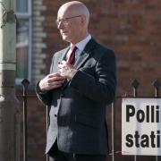 First Minister and SNP leader John Swinney after casting his vote