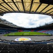 Selling alcohol at football grounds across Scotland has been banned since 1980