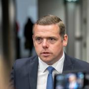 A bitter contest has erupted to replace outgoing Scottish Tory leader Douglas Ross