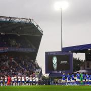 Birmingham City and Rangers players during a minute applause in memory of former player Trevor Francis