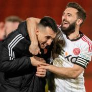 Aberdeen’s Graeme Shinnie and Bojan Miovski celebrate together