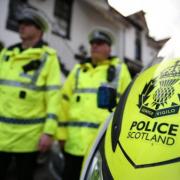 Stock image of Police Scotland officers and motorbike