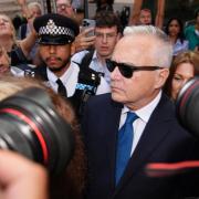 Former BBC broadcaster Huw Edwards leaves Westminster Magistrates' Court, London, where he pleaded guilty to three counts of making indecent images of children.