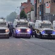 Police dealing with disorder in Belfast on Saturday night (PA)