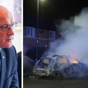 First Minister John Swinney, and a firefighter tending to a burning police car following a violent riot in Hartlepool