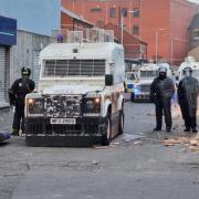 PSNI officers man road blocks in Belfast following an anti-Islamic protest outside Belfast City Hall on August 3