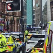 Police officers were called to a report of a woman being struck by a car on Wellington Lane at about 2.40pm on Tuesday