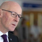 First Minister John Swinney during a visit to the Edinburgh Cancer Care Centre