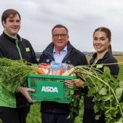 Asda Huntly produce colleague Rhys McWilliam, owner of Benzies Produce Philip Benzies and Asda Hunty section leader Rebecca MacDougall