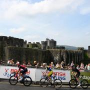 The Tour of Britain will start in Kelso on Tuesday. Shown: the race passing Caerphilly Castle in Wales