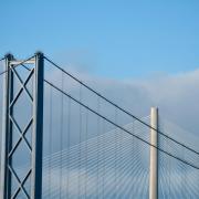 A view of the Forth Road Bridge (front) and the Queensferry Crossing