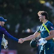 Marcus Stoinis and Matt Cross shake hands at the end of Australia's comprehensive win